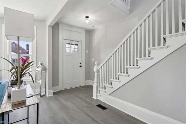 318 Sycamore Ave, Newport News, VA 23607 - entrance foyer featuring wood finished floors, baseboards, and stairway