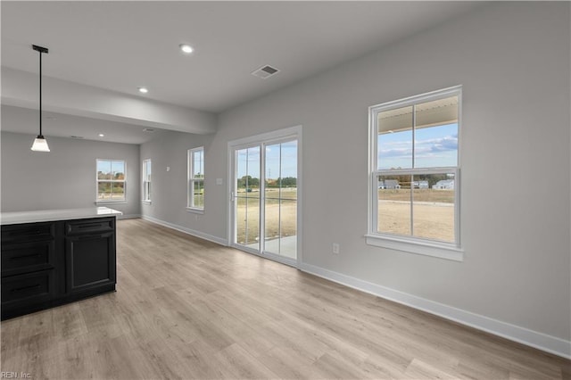 interior space with light hardwood / wood-style flooring