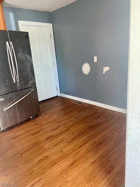 interior space with hardwood / wood-style flooring