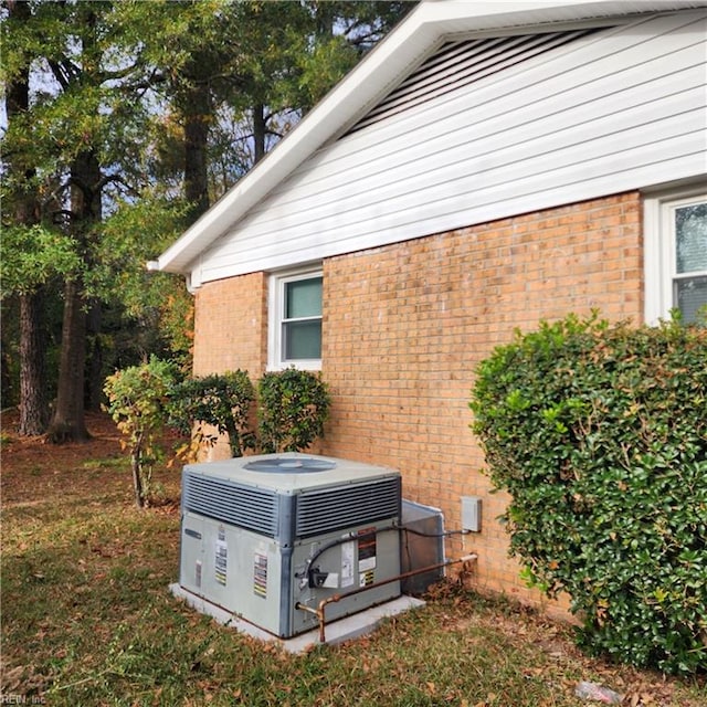 exterior details featuring central AC unit