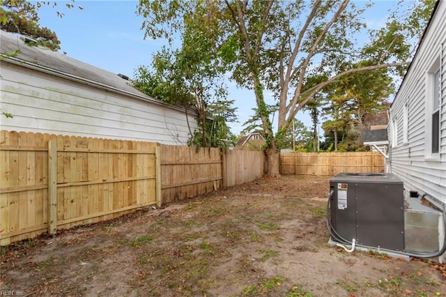 view of yard featuring central AC unit