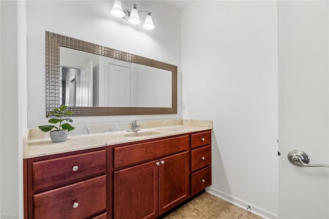 bathroom with vanity and tile patterned floors