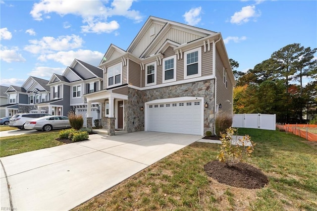 view of front of home featuring a garage and a front lawn