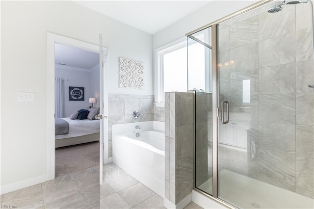 5039 Annapolis Dr, Chesapeake, VA 23321 - ensuite bathroom featuring a bath, marble finish flooring, a stall shower, and baseboards