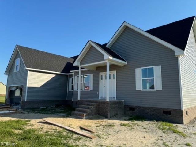 view of front of home with crawl space