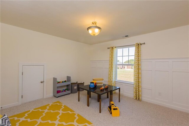 playroom with light colored carpet