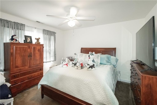 carpeted bedroom with ceiling fan