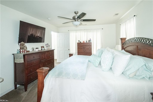 carpeted bedroom featuring ceiling fan