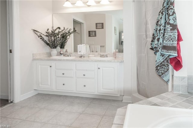 bathroom featuring vanity and tile patterned flooring