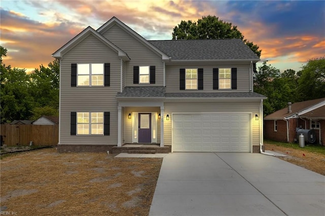 view of front of property featuring a garage