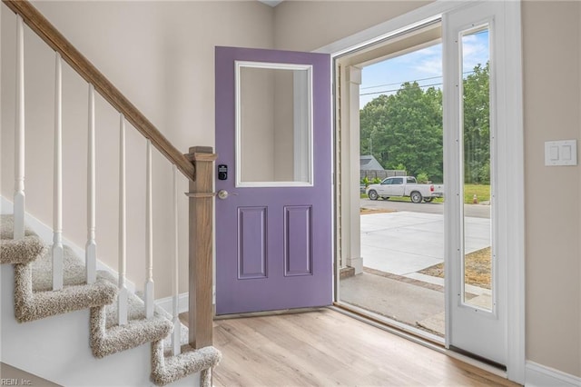 doorway to outside featuring light hardwood / wood-style flooring