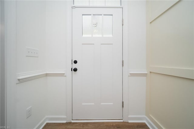 foyer entrance featuring hardwood / wood-style floors