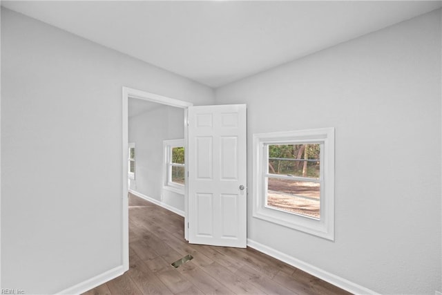 empty room featuring wood-type flooring