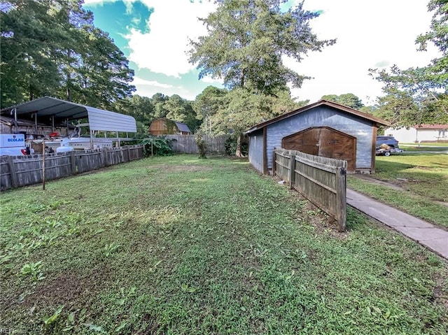 view of yard featuring a carport