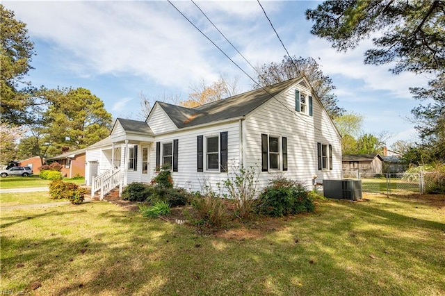 view of side of home featuring a lawn