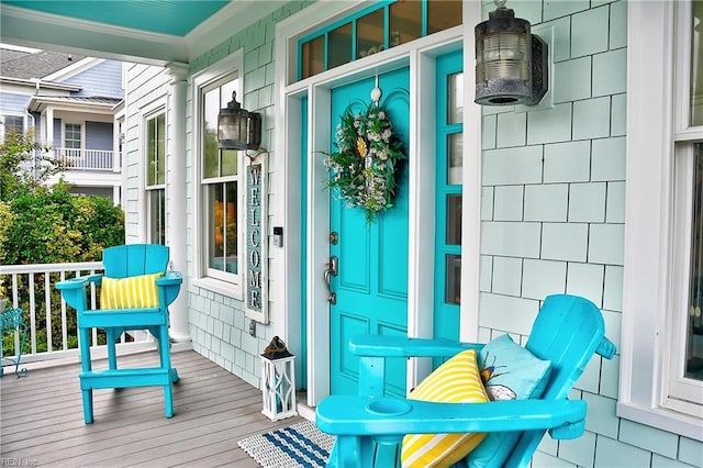 property entrance featuring covered porch