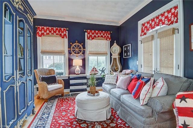 living area featuring ornamental molding and hardwood / wood-style floors