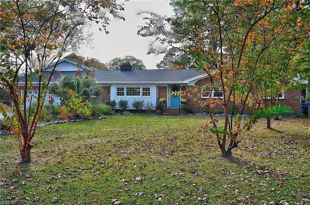 ranch-style house with a front yard