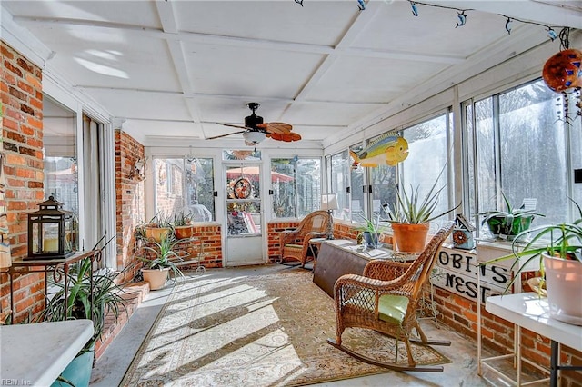 sunroom featuring ceiling fan and coffered ceiling