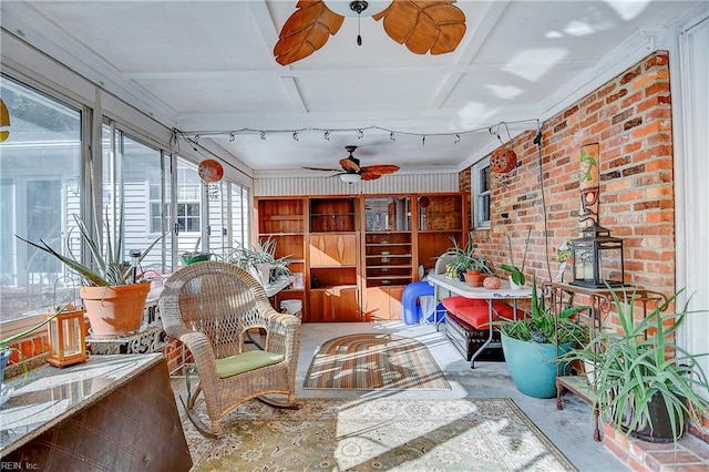 sunroom / solarium with rail lighting and ceiling fan