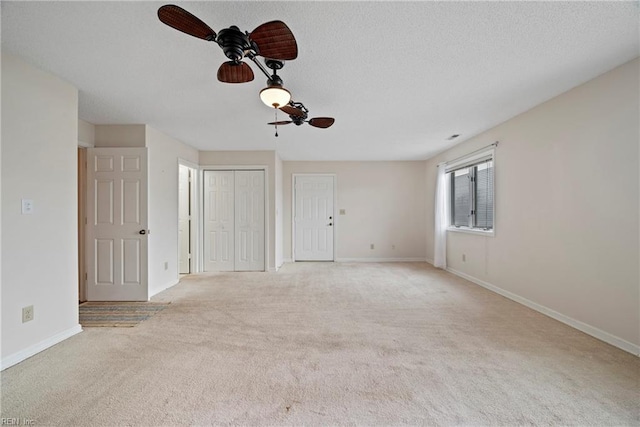 157 Atlantic Ave Unit B2, Hampton, VA 23664 - empty room with light carpet, baseboards, and a ceiling fan