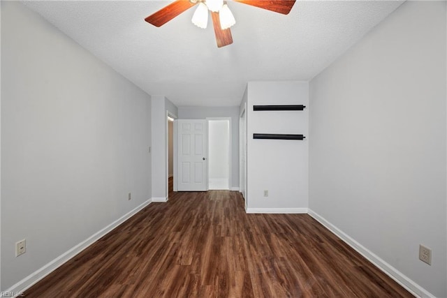 157 Atlantic Ave Unit B2, Hampton, VA 23664 - empty room featuring dark wood-style floors, baseboards, and a ceiling fan