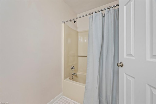 157 Atlantic Ave Unit B2, Hampton, VA 23664 - bathroom featuring baseboards and shower / bath combo