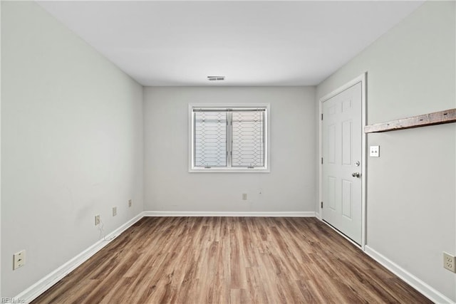 157 Atlantic Ave Unit B2, Hampton, VA 23664 - spare room with wood finished floors and baseboards