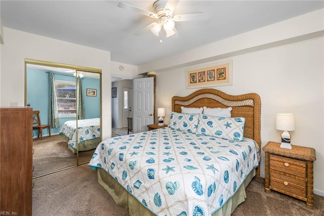 carpeted bedroom featuring a closet and ceiling fan