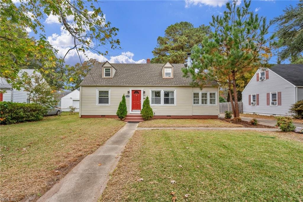 cape cod-style house with a front lawn