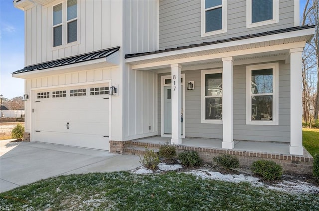 view of front of home with a garage and covered porch