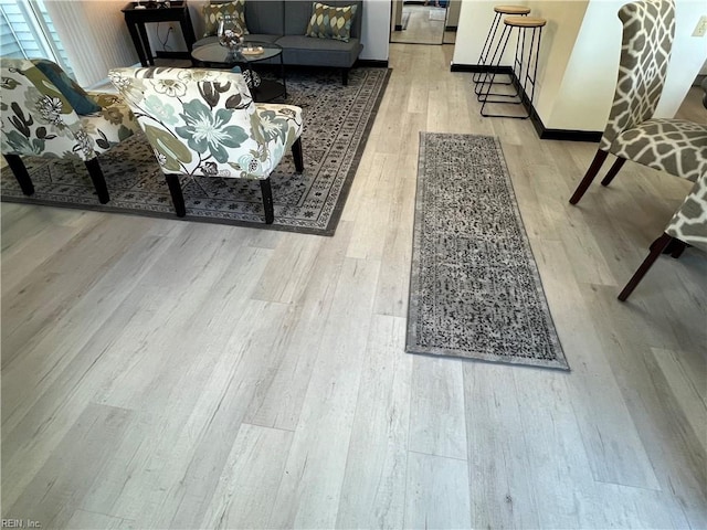 living room featuring light wood-type flooring