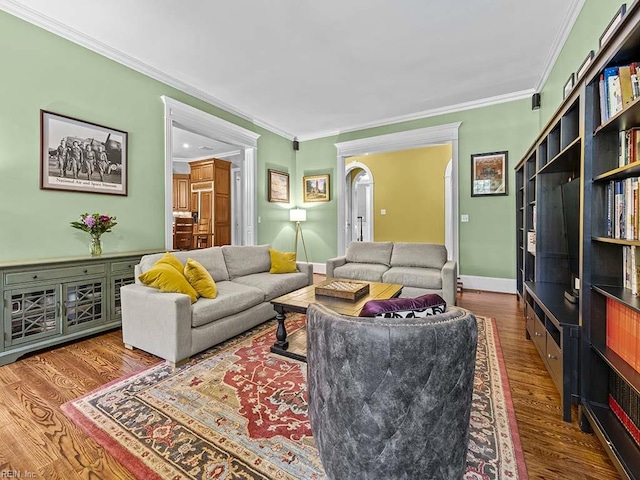 living room featuring hardwood / wood-style flooring and ornamental molding