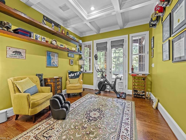 living area with french doors, hardwood / wood-style floors, coffered ceiling, beamed ceiling, and crown molding