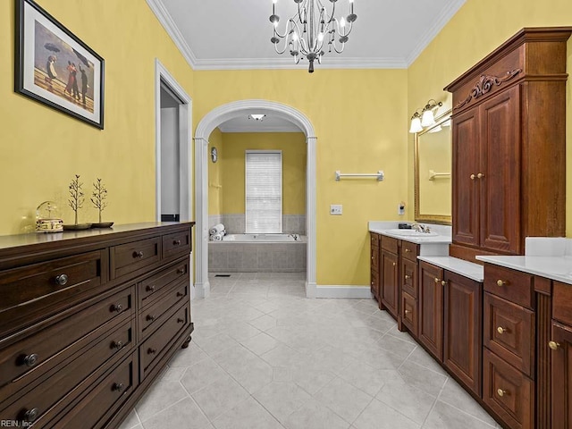 bathroom with tiled bath, tile patterned flooring, an inviting chandelier, and ornamental molding