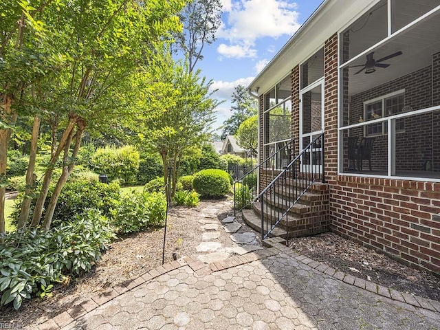 view of patio with ceiling fan