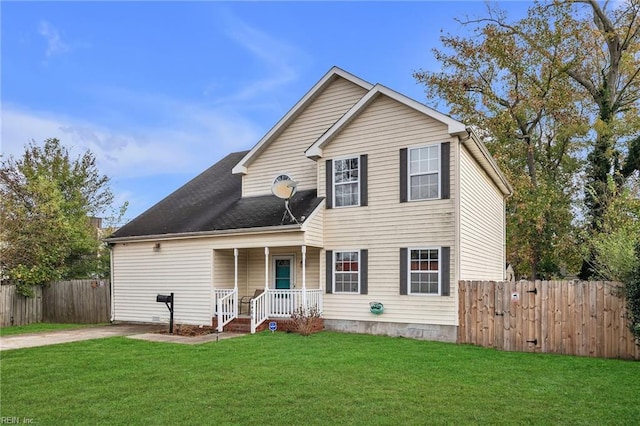 view of front of house with a front lawn and a porch