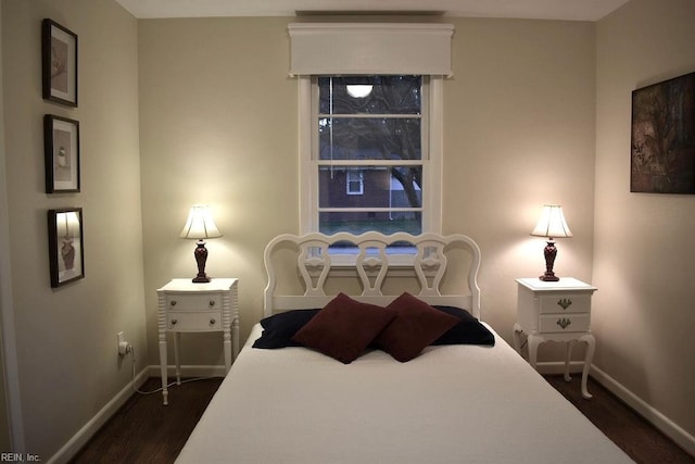 bedroom featuring dark hardwood / wood-style floors