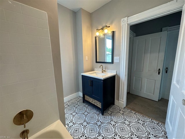 bathroom with vanity, shower / tub combination, and tile patterned floors