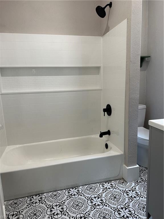 full bathroom with tile patterned flooring, vanity, toilet, and tub / shower combination