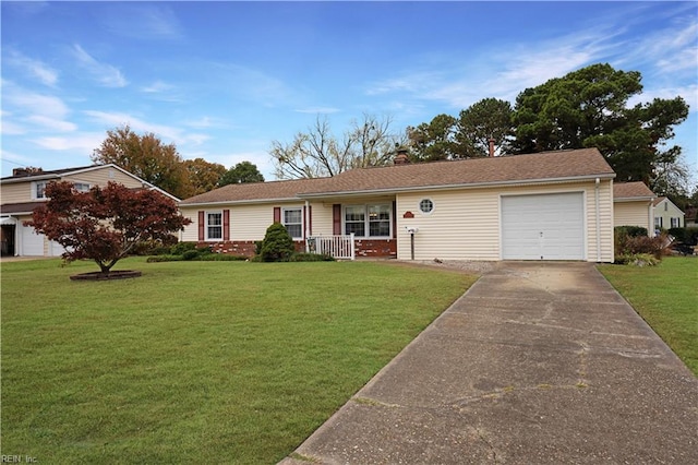 ranch-style home with a garage and a front lawn