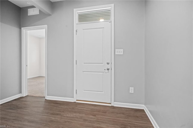 entrance foyer with dark hardwood / wood-style floors