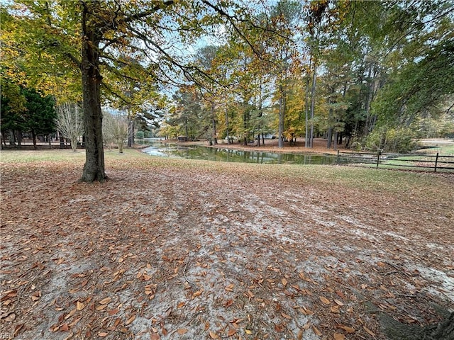 view of yard with a water view