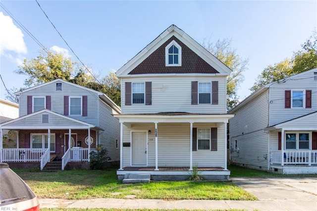 228 Libby St, Hampton, VA 23663 - view of front of house featuring covered porch and a front lawn