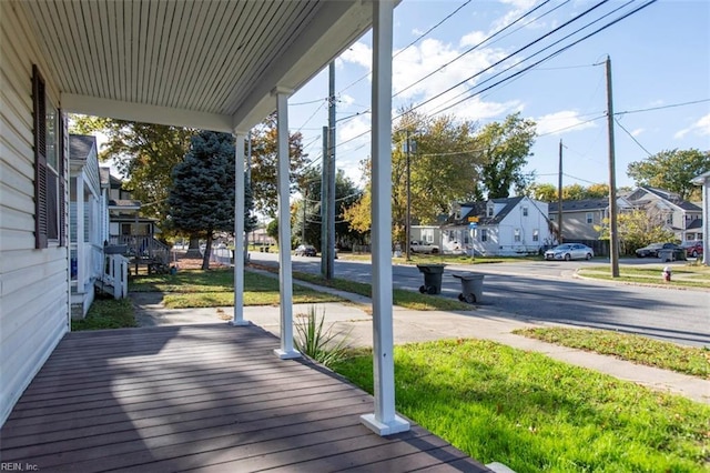 228 Libby St, Hampton, VA 23663 - wooden porch with a residential view