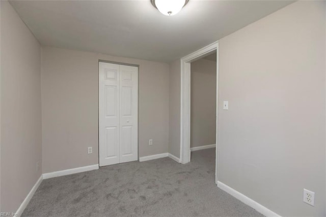 228 Libby St, Hampton, VA 23663 - unfurnished bedroom with carpet floors, a closet, and baseboards