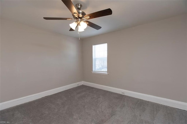 228 Libby St, Hampton, VA 23663 - empty room featuring dark carpet, baseboards, and a ceiling fan