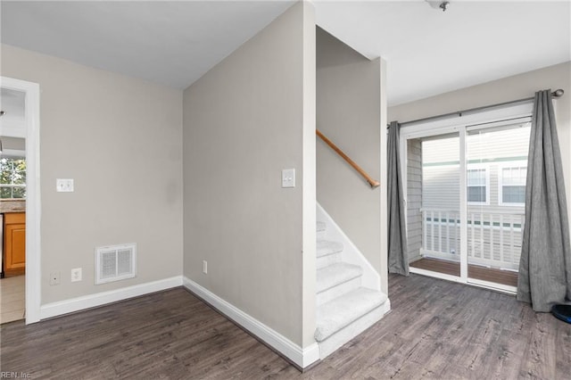 interior space with dark hardwood / wood-style flooring