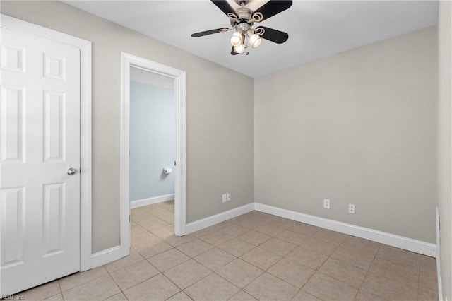 unfurnished bedroom with ceiling fan and light tile patterned flooring