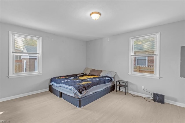 bedroom with light hardwood / wood-style flooring